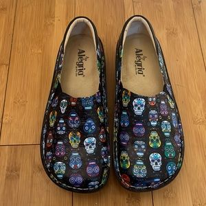 Slip on Alegria shoes.